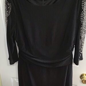 Elegant Black Dress with Embellished Sleeves